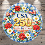 A circular sign with a floral wreath surrounding it, featuring the text "USA 250" and the dates "1776" and "2026" at the bottom.