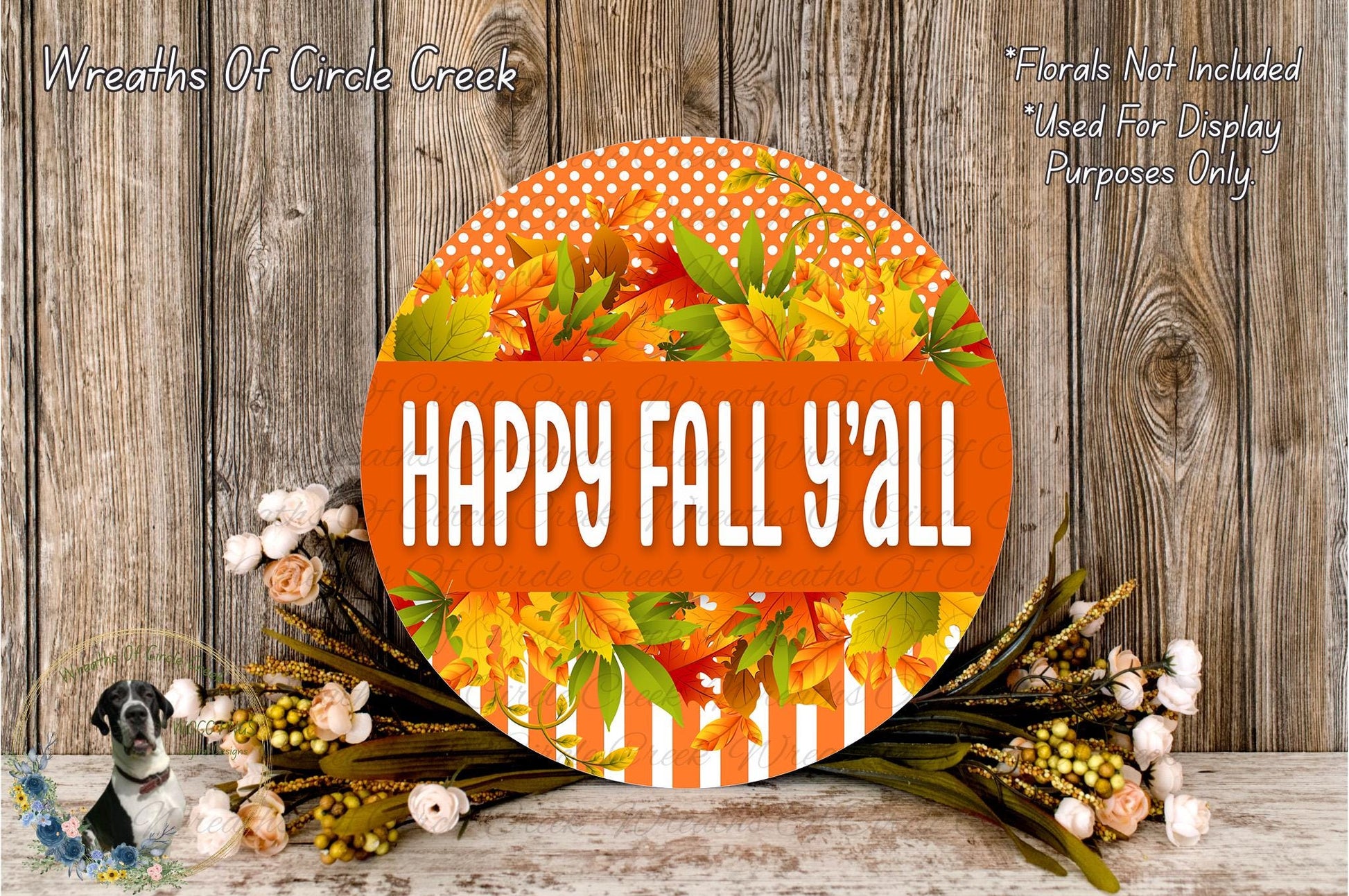 a round sign with the text "HAPPY FALL Y'ALL" displayed prominently in the center. The sign is surrounded by a wreath of autumn leaves and flowers, creating a festive and seasonal atmosphere.