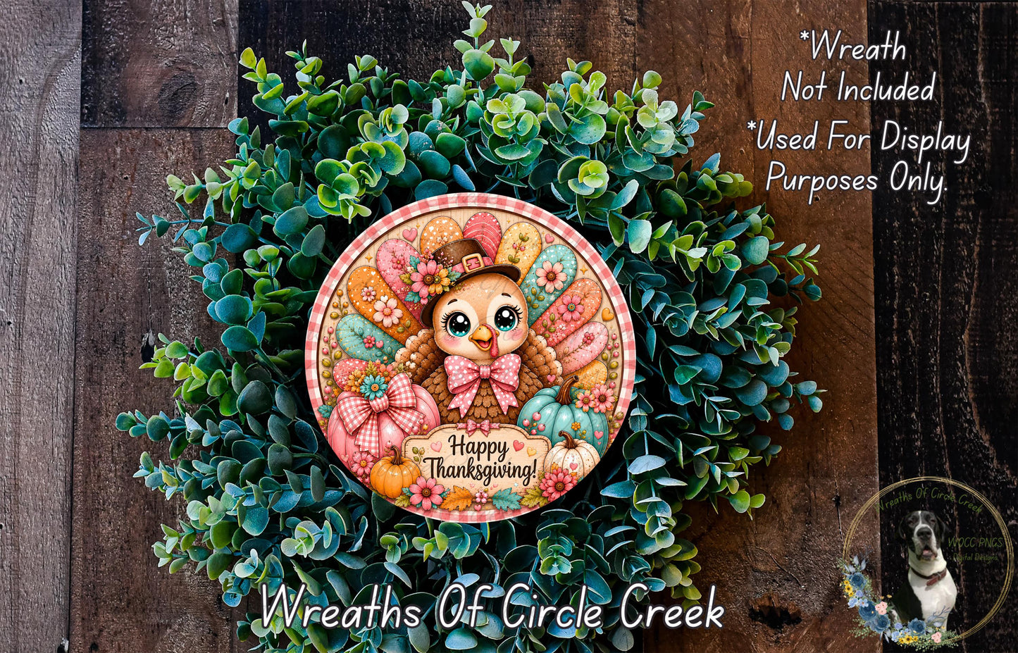 A wreath made of green leaves and a colorful bird design, with the text "Happy Thanksgiving!" displayed on it.