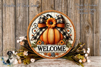 a decorative welcome sign with a pumpkin and floral elements, placed on a wooden surface.