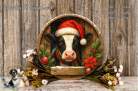 A black and white cow wearing a Santa hat is surrounded by a wreath of flowers and greenery, with a wooden frame. The background is a wooden wall with snowflakes falling.