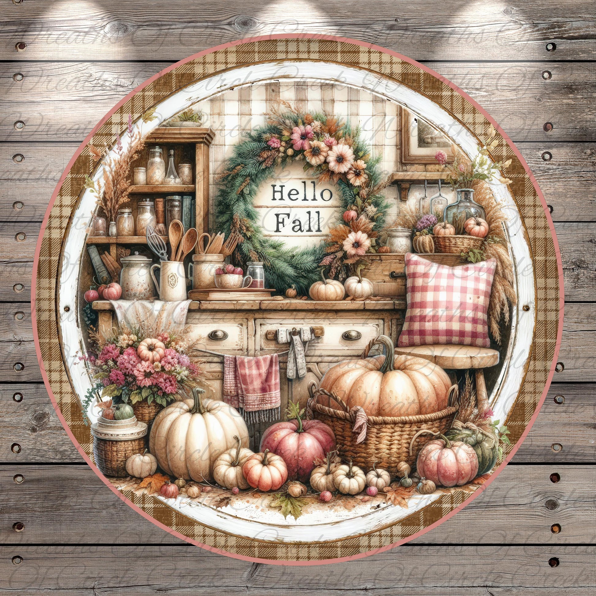 A round, decorative plate with a wreath and various fall-themed items arranged on a wooden surface.