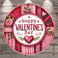 A circular, decorative plate with a "Happy Valentine's Day" message in the center, surrounded by various floral and patterned elements such as roses, leaves, and plaid fabric.