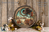 a decorative wooden plaque with a cowboy hat, a rope, and flowers, along with a sign that says "Home Sweet Home". The plaque is placed on a wooden surface, surrounded by flowers and greenery.