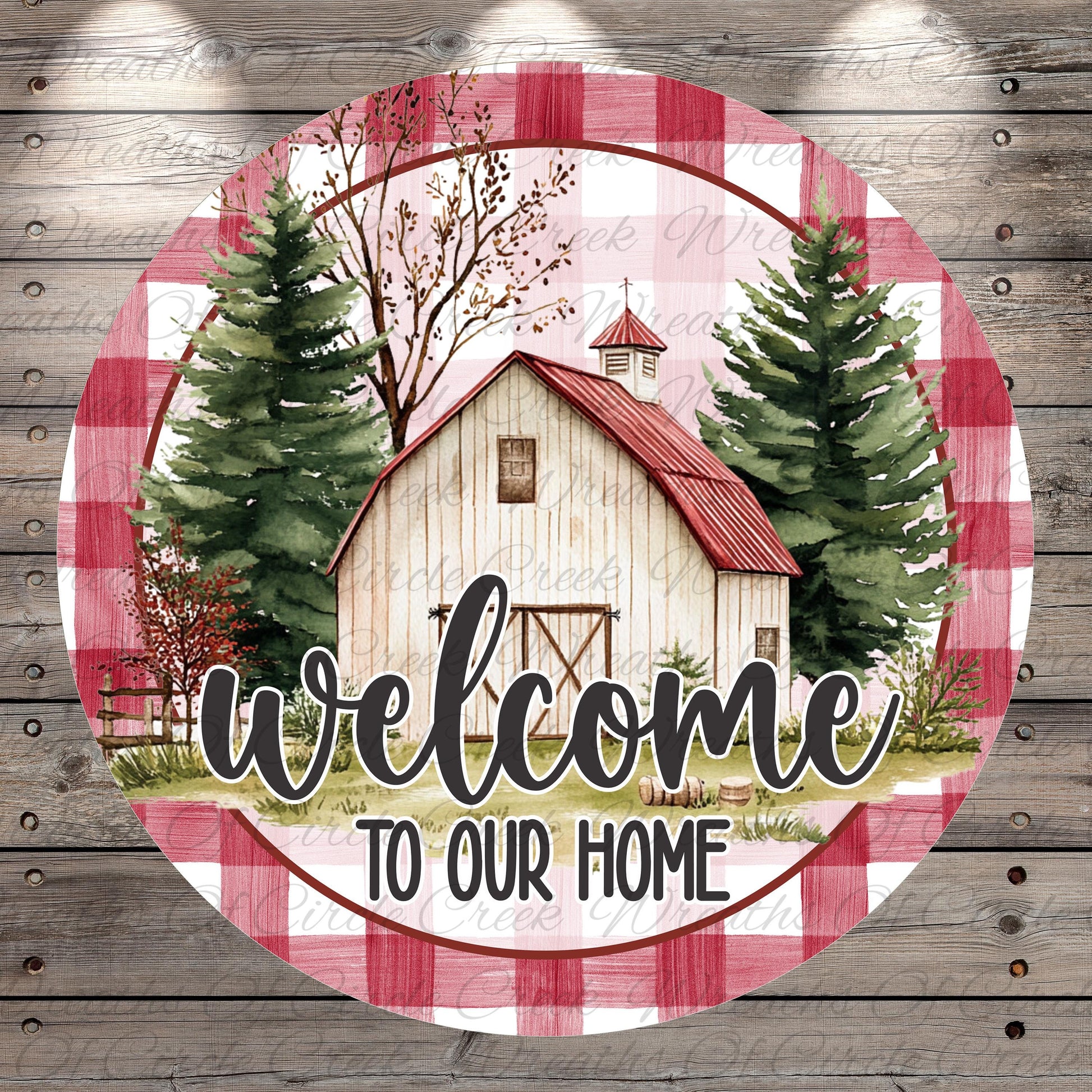 A circular sign with a rustic barn and pine trees, surrounded by a red and white checkered pattern, with the text "Welcome to Our Home" displayed prominently.