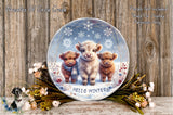 A decorative plate featuring three cows standing together in a snowy winter scene, surrounded by flowers and a wreath.