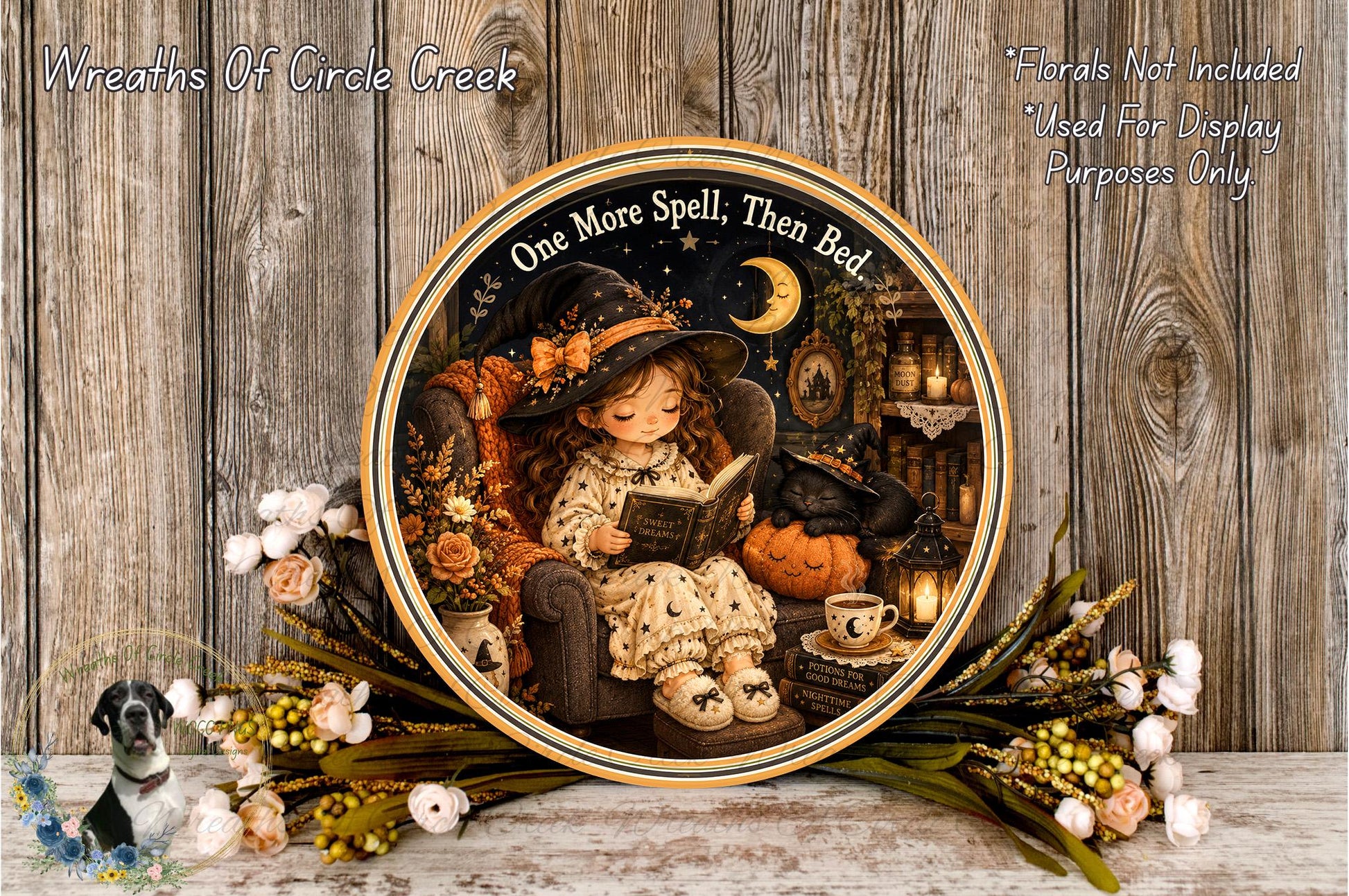 A decorative plate featuring a young girl reading a book, surrounded by a cozy, autumnal scene with flowers, a pumpkin, and a cat.