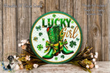 a circular sign with the text "Lucky Girl" and a pair of green cowboy boots, surrounded by Irish-themed decorations such as shamrocks and flowers.