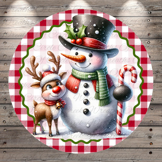 A snowman and a reindeer standing together on a red and white checkered background.