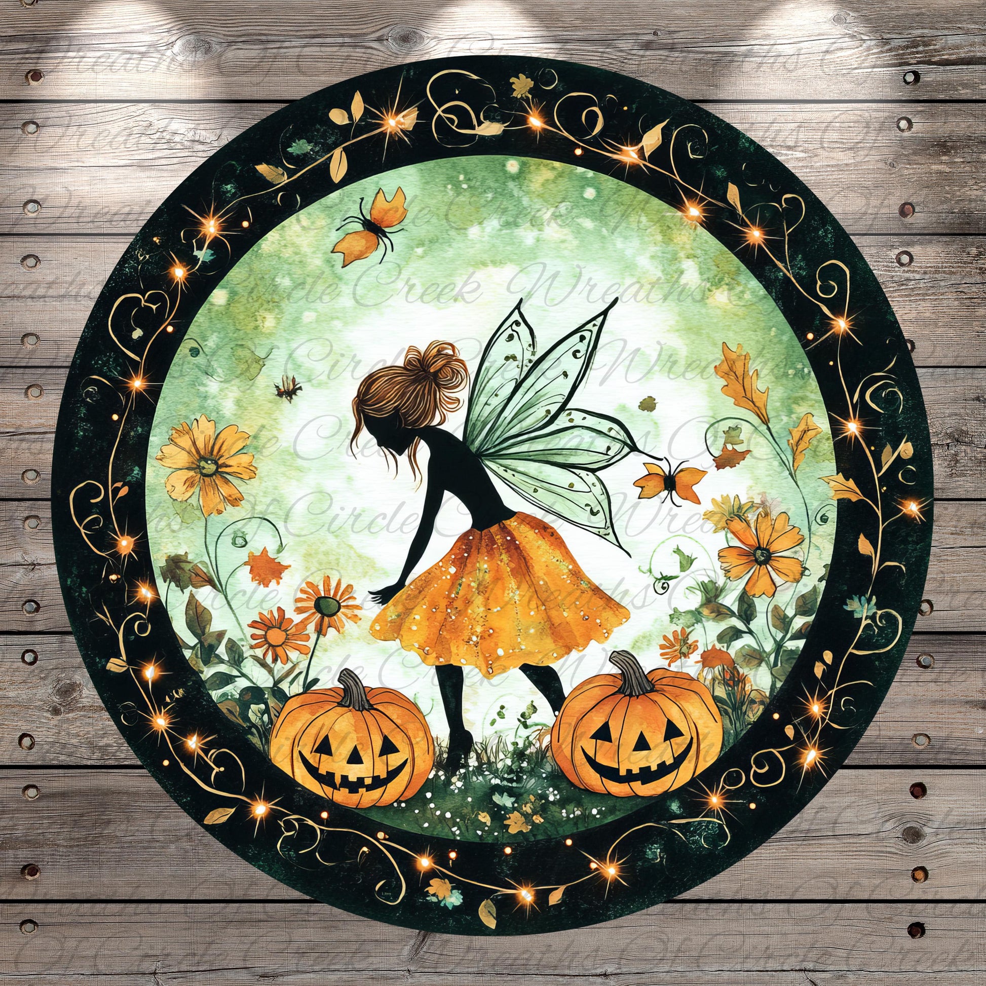 A fairy with a green fairy tail and wings is surrounded by pumpkins, flowers, and butterflies in a circular frame with a black border and gold accents.