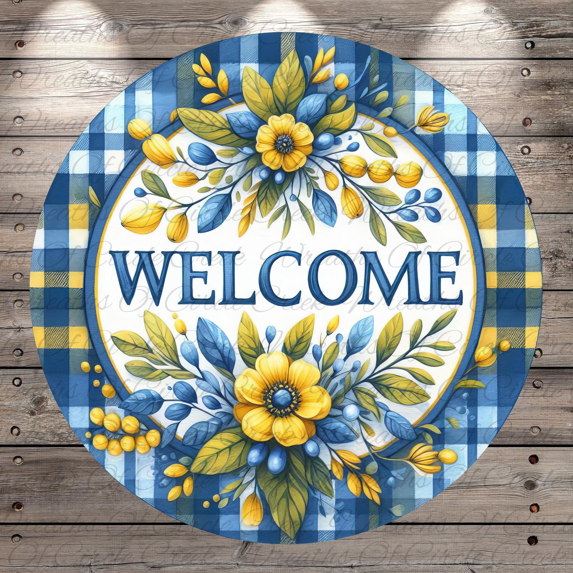 A circular welcome sign with a blue and yellow floral design, featuring the word "WELCOME" prominently displayed in the center.