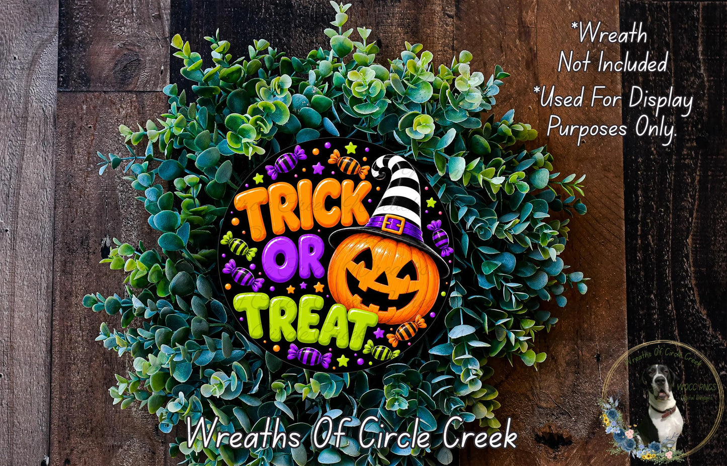 A Halloween-themed wreath made of green foliage and a carved pumpkin, with the text "Trick or Treat" prominently displayed.