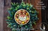 a wreath with a welcome sign on it