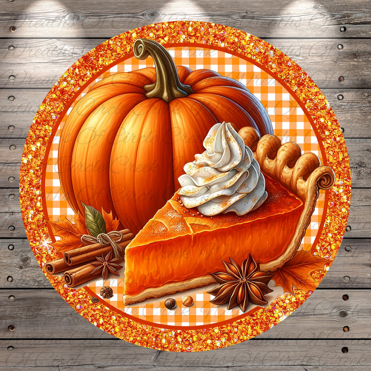 A large orange pumpkin with a whipped cream pie on top, surrounded by cinnamon sticks, anise seeds, and autumn leaves, all set against a wooden background with a glittery border.
