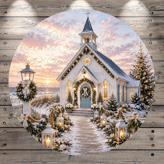 A beautifully decorated white church with a steeple, surrounded by a wreath of flowers, lights, and a Christmas tree, set against a picturesque snowy landscape with a sunset in the background.