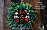 a wreath with a man's face in the center, surrounded by a green plant. The wreath is described as a "Wreath of Circle Creek" and is not included in a display.