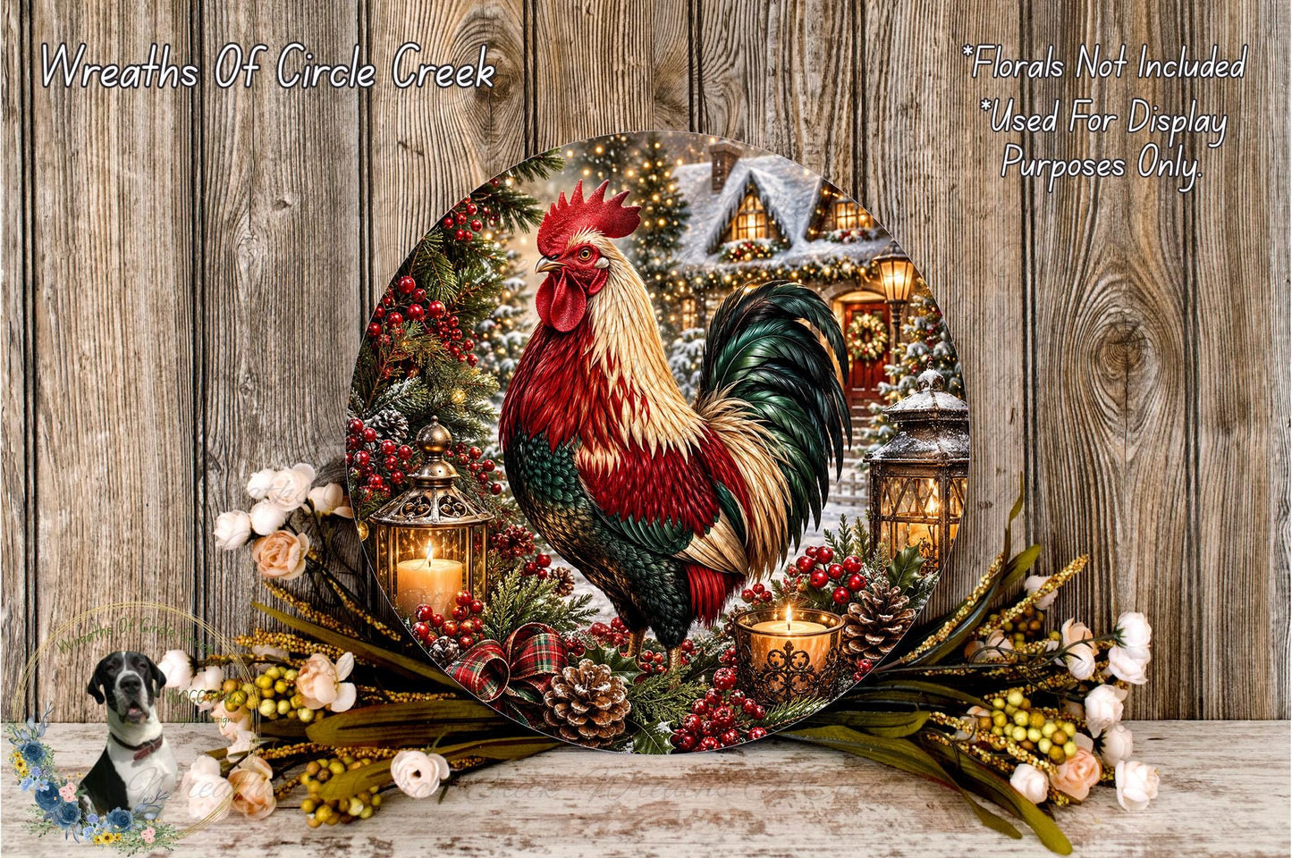 A decorative rooster surrounded by a wreath of flowers and pine cones, with a lantern and other holiday decorations in the background.