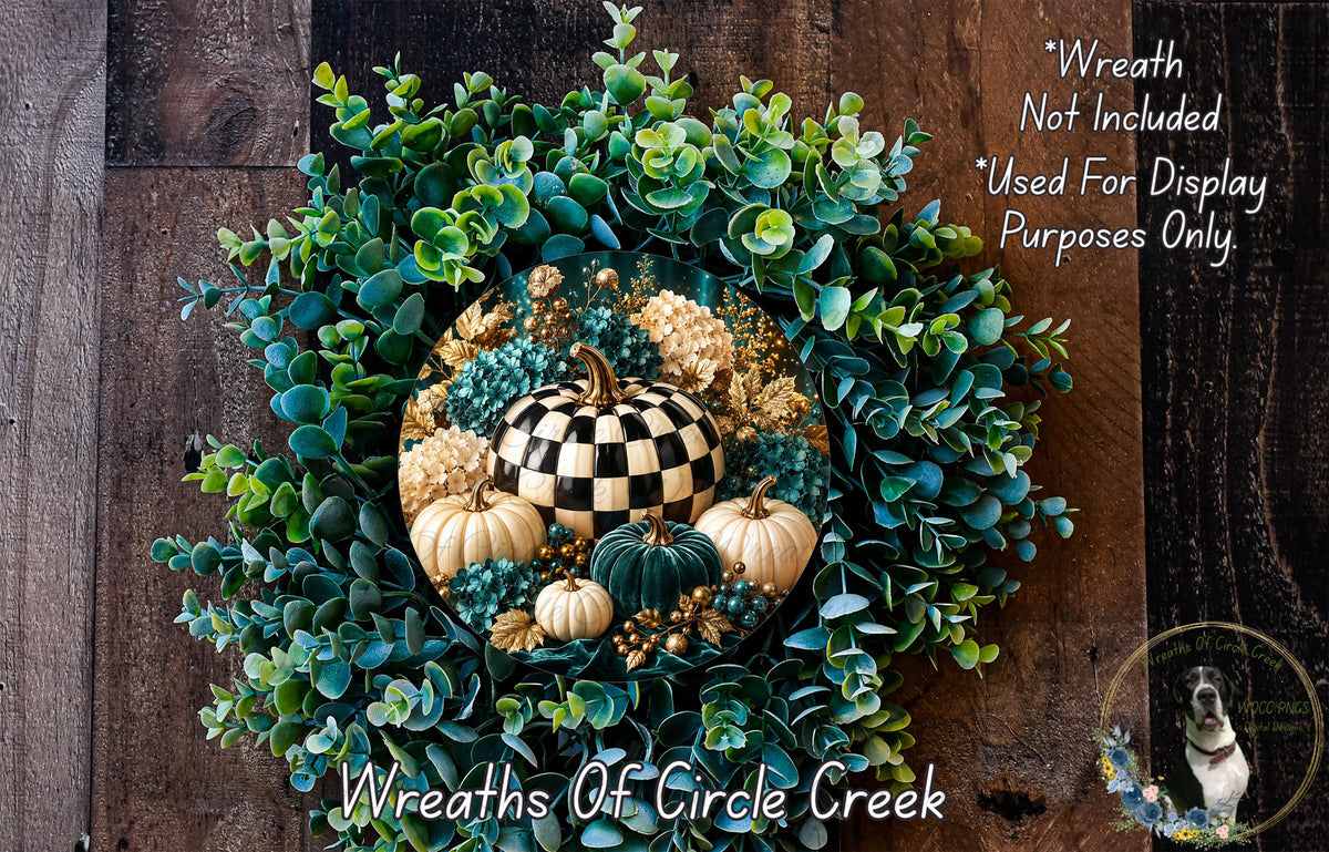 a wreath made of various materials, including green leaves, a black and white checkered pumpkin, and other decorative elements. The wreath is displayed on a wooden surface, and there is a small dog in the background.
