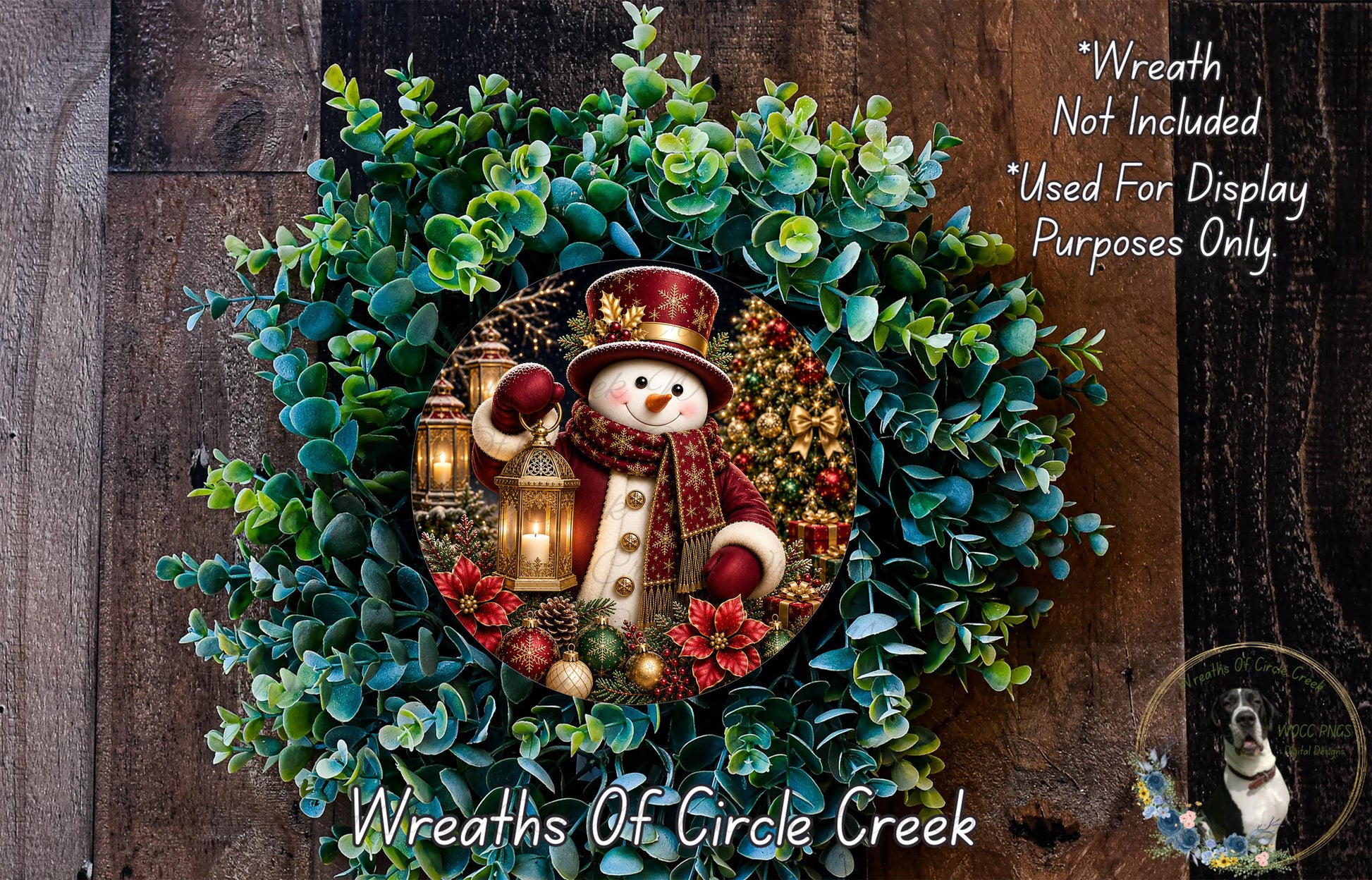 A wreath featuring a snowman, lanterns, and greenery, with a caption stating that it is not included in a display and is used for purposes only.