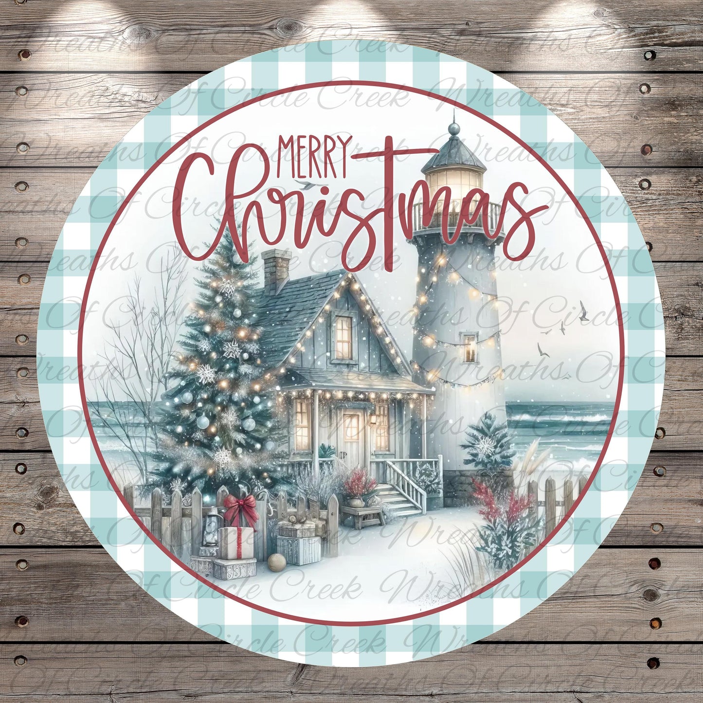 A circular Christmas-themed design featuring a lighthouse, a decorated Christmas tree, and a house with lights, all set against a snowy landscape.