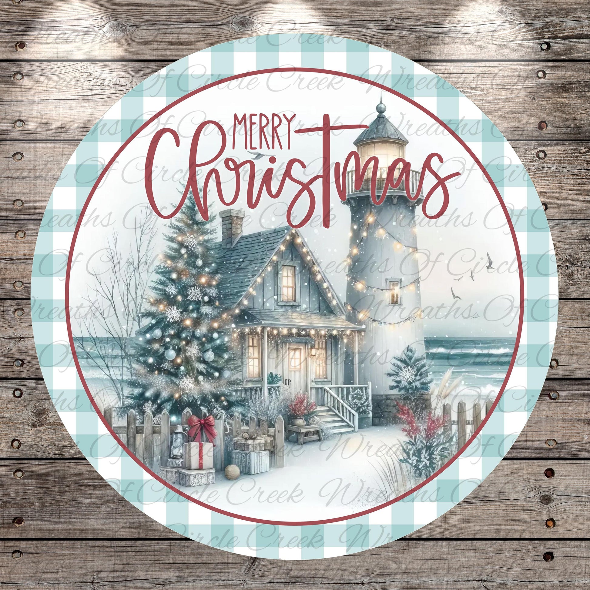 A circular Christmas-themed design featuring a lighthouse, a decorated Christmas tree, and a house with lights, all set against a snowy landscape.