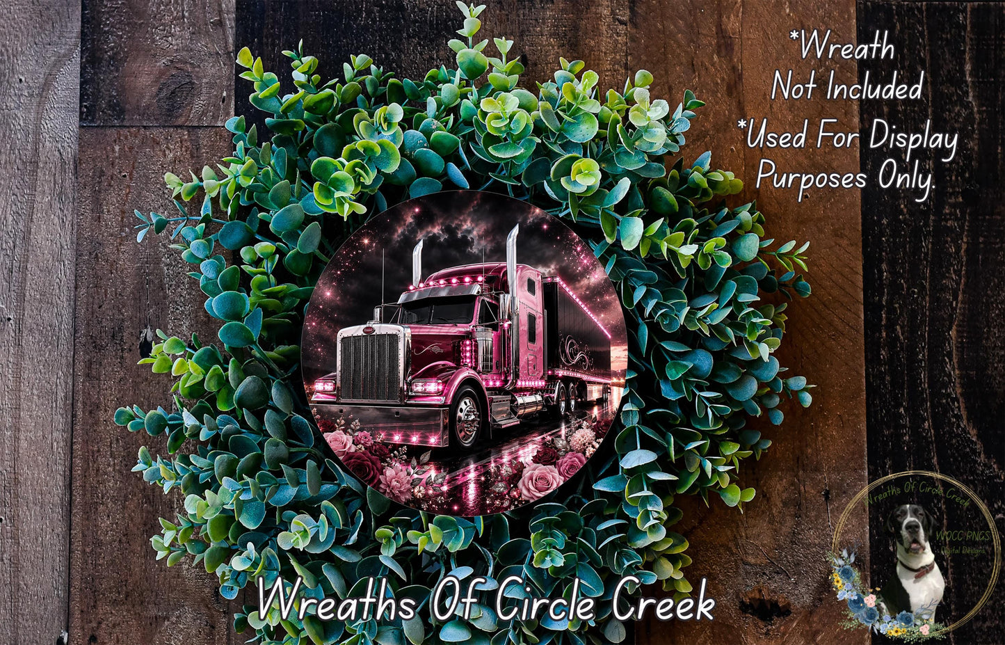 A wreath made of green leaves and flowers, with a large image of a red truck in the center.