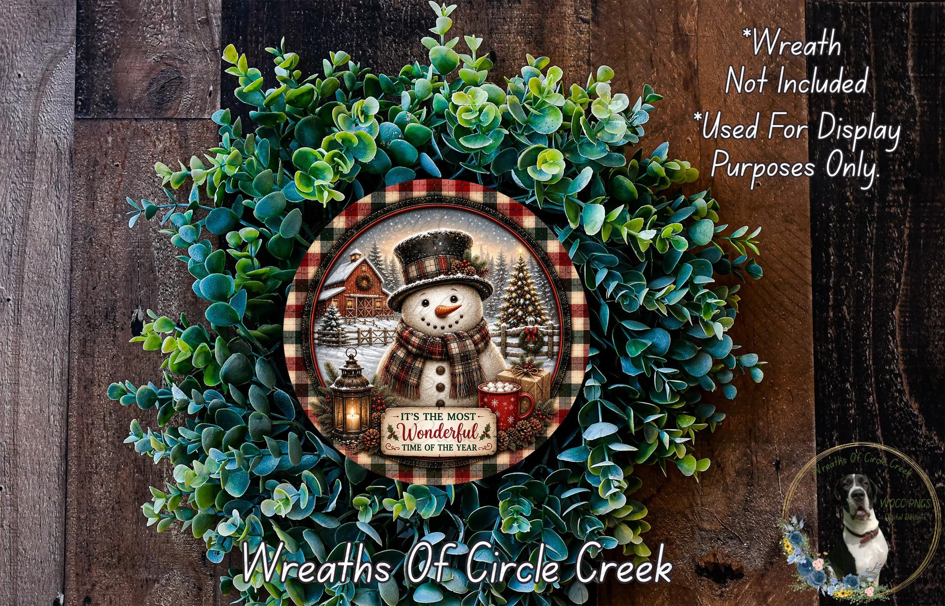 A wreath featuring a snowman and a Christmas tree, with the text "It's the most wonderful time of the year" and "It's the most wonderful time of the year" written on it.