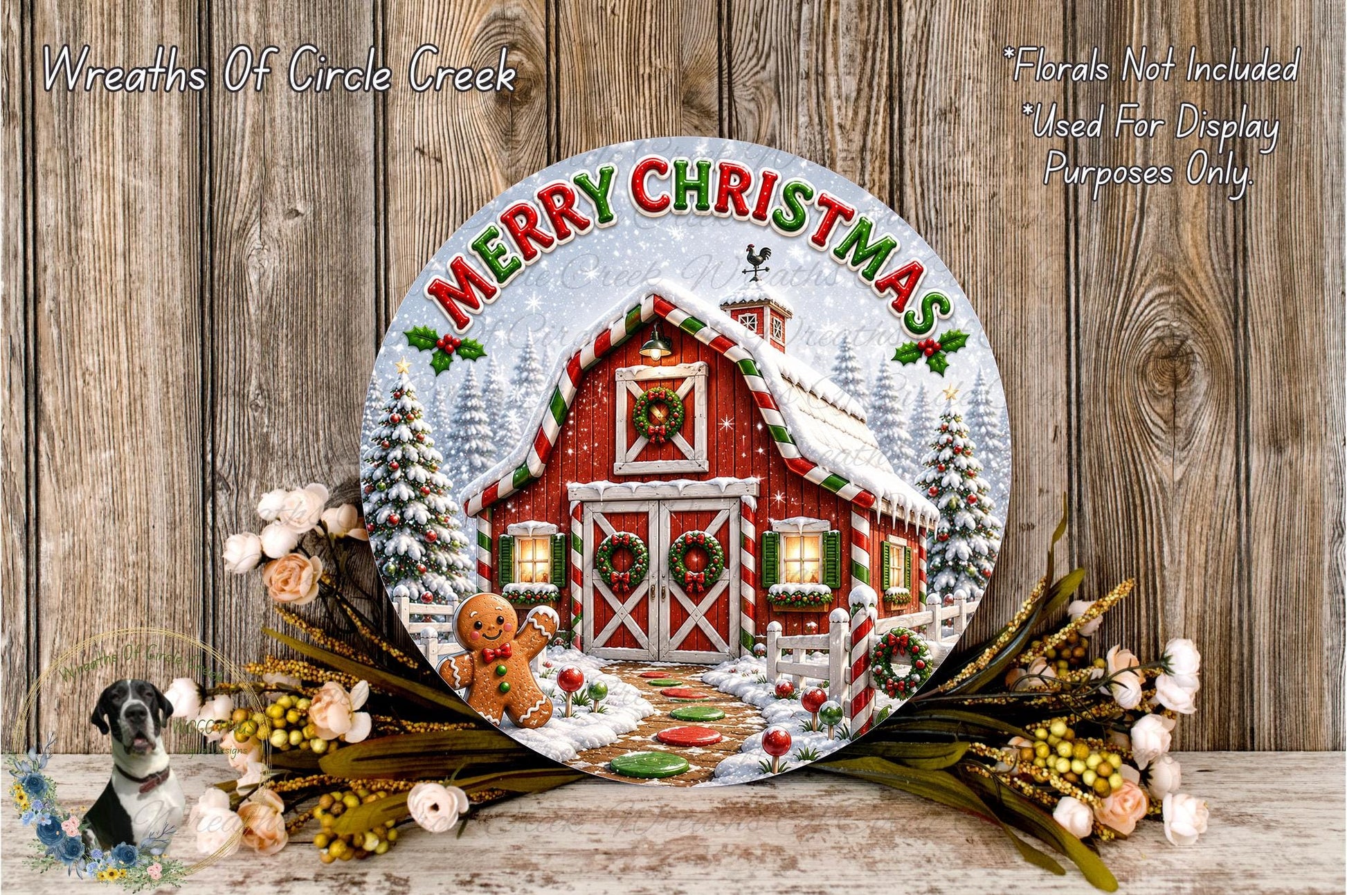 A festive Christmas wreath with a red barn and snow-covered trees, surrounded by flowers and a gingerbread man figure.