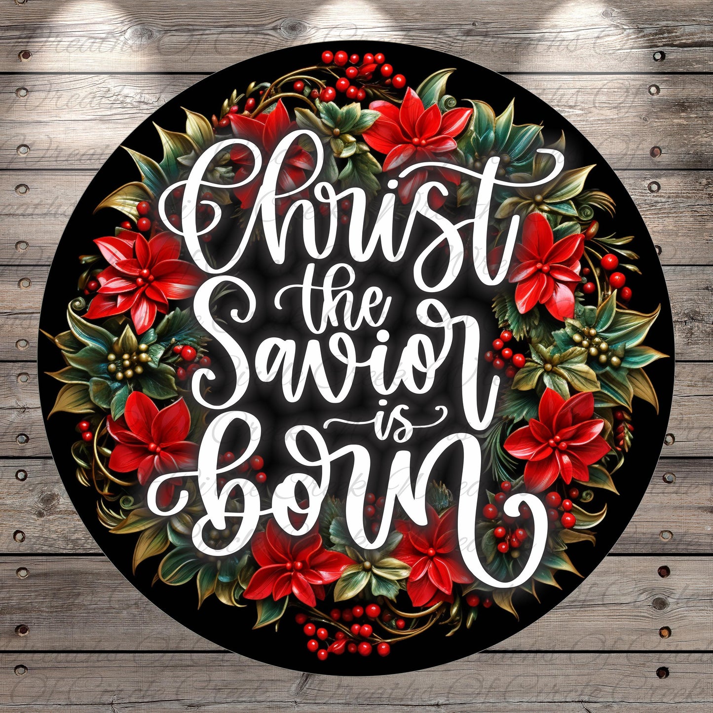 A circular wreath with red poinsettia flowers and greenery surrounding a message that reads "Christ the Saviour is born".