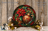 a decorative wreath with a red poinsettia flower, gold ornaments, and greenery, placed on a wooden surface.