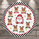 A round Christmas-themed table runner or mat featuring a Santa Claus image surrounded by seven reindeer with different names, all set against a black and white checkered background with stars.