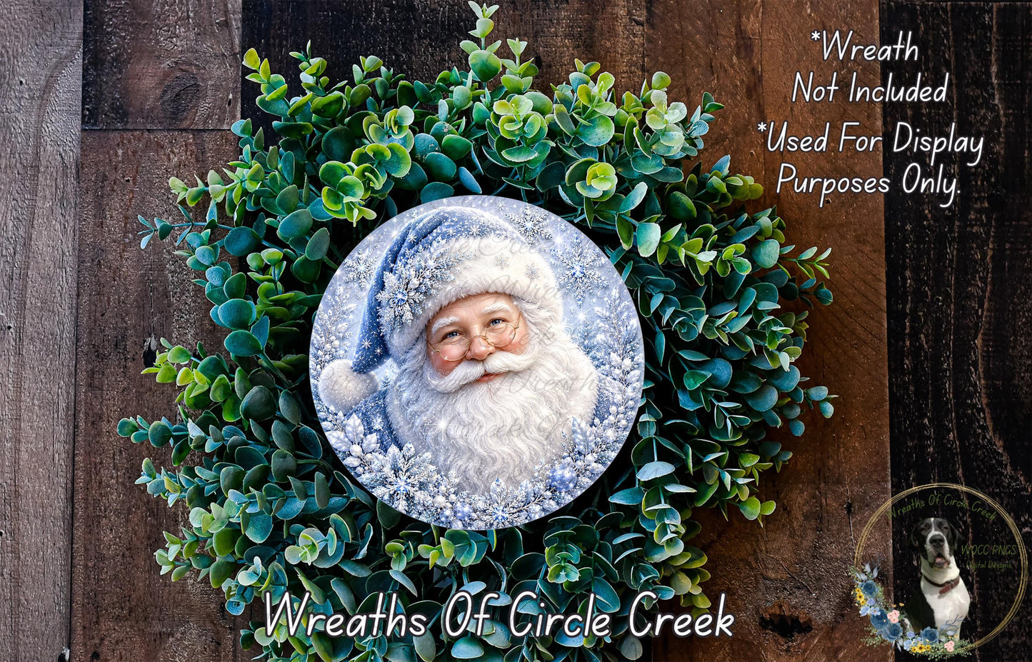 A wreath featuring a Santa Claus image surrounded by greenery, with a text overlay that reads "Wreath Not Included * Used For Display Purposes Only" and "Wreaths of Circle Creek".