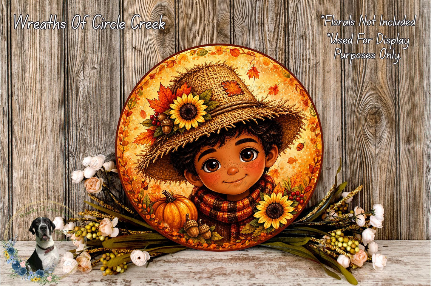 A decorative plate featuring a young boy wearing a straw hat and scarf, surrounded by autumn flowers and a pumpkin, against a wooden background.