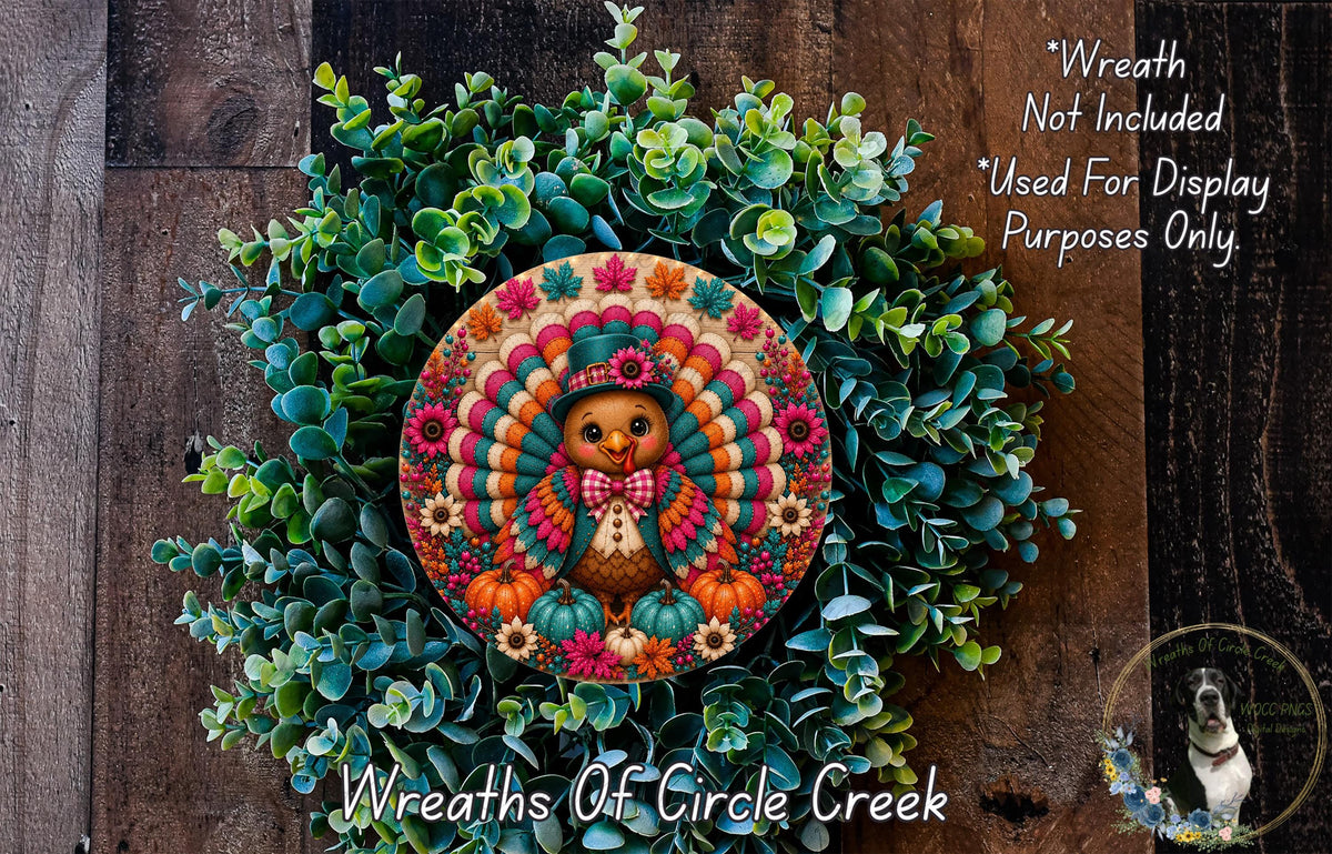 A wreath made of green leaves and flowers, with a colorful turkey decoration in the center.