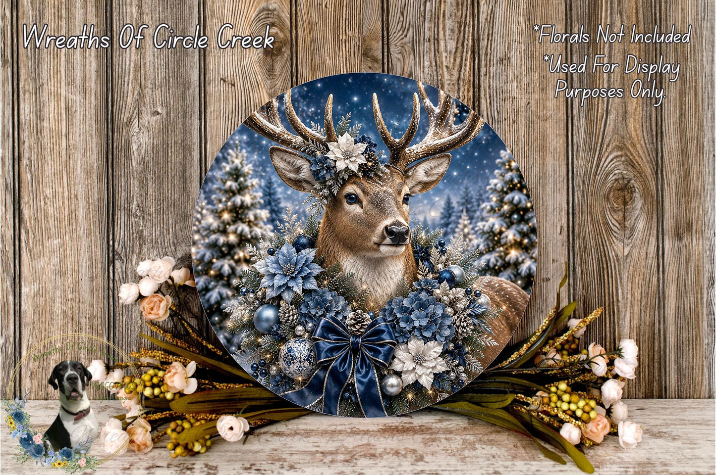 A decorative wreath featuring a deer head surrounded by flowers and greenery, set against a snowy winter landscape.