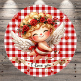 A cheerful illustration of a cherub-like figure with curly hair, wings, and a flower crown, holding a bow and arrow, set against a red and white checkered background with the text "I love you" below.