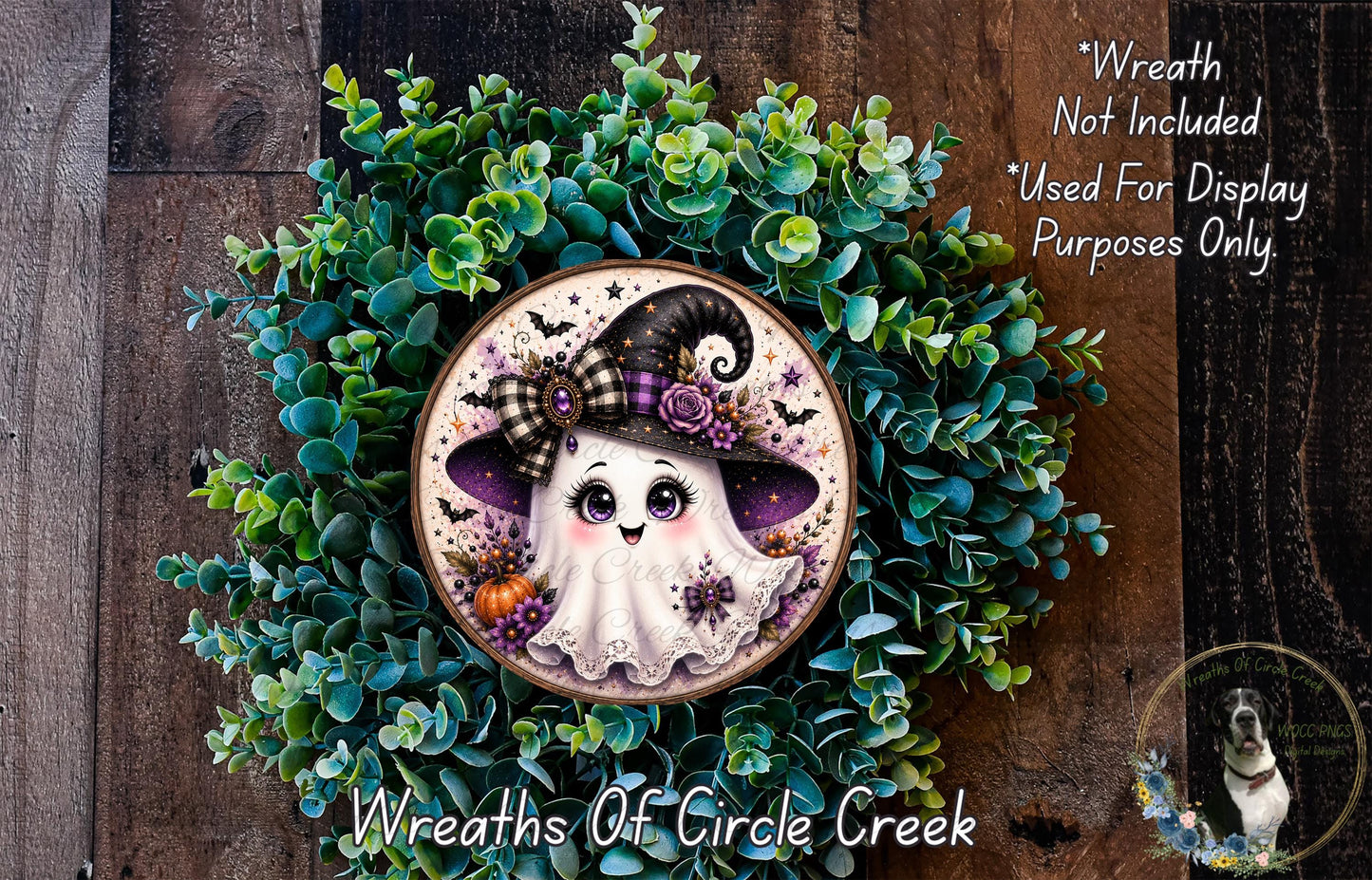 A wreath made of green leaves and a white ghost with a black hat and purple bow, with the text "Wreath Not Included * Used For Display Purposes Only" and "Wreaths of Circle Creek" below it.