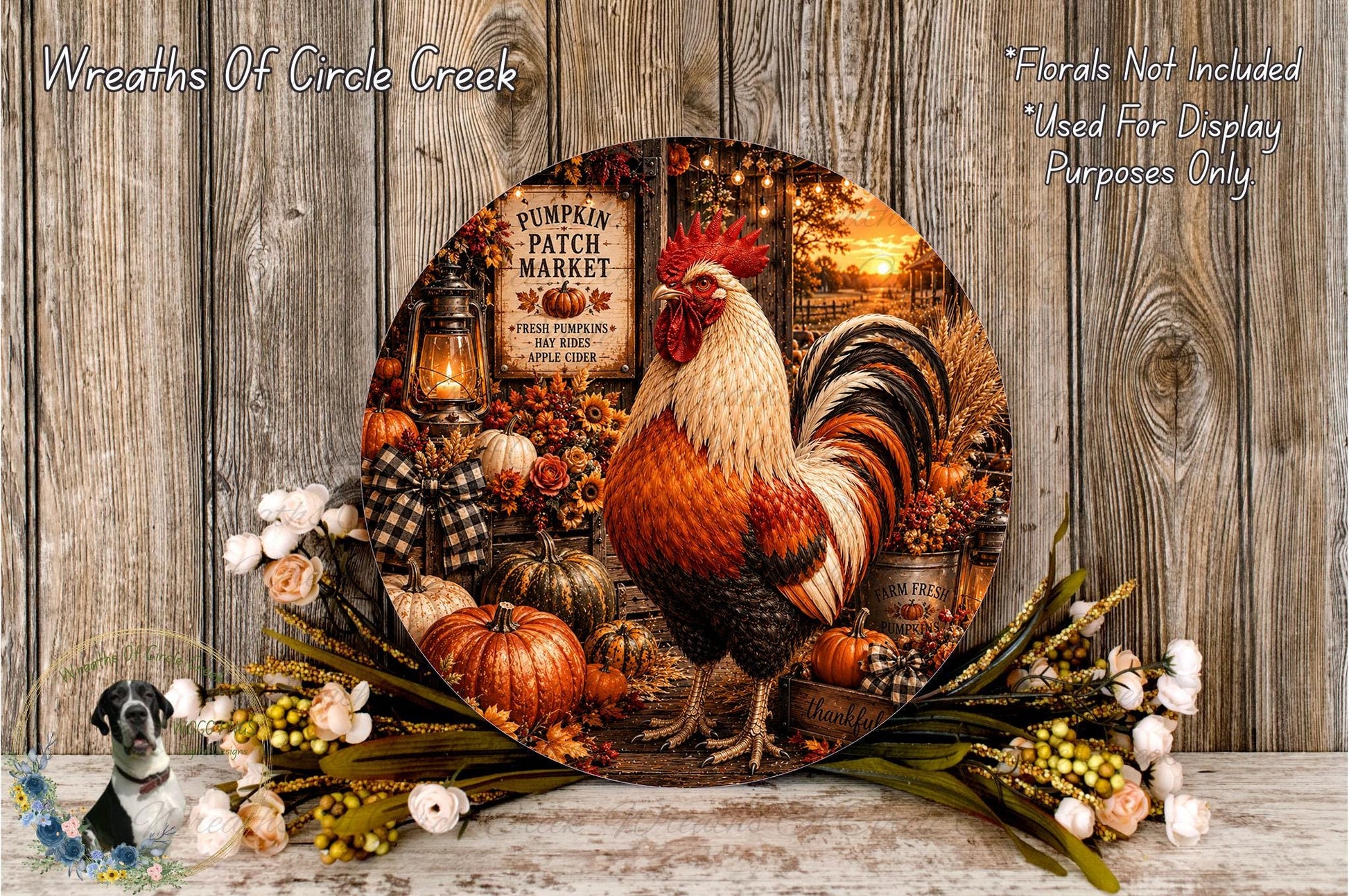 A decorative wreath featuring a rooster surrounded by fall-themed elements such as pumpkins, gourds, and flowers, set against a rustic wooden background.