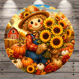 A cheerful scarecrow stands amidst a vibrant autumn scene, holding a bouquet of sunflowers and surrounded by pumpkins and gourds.