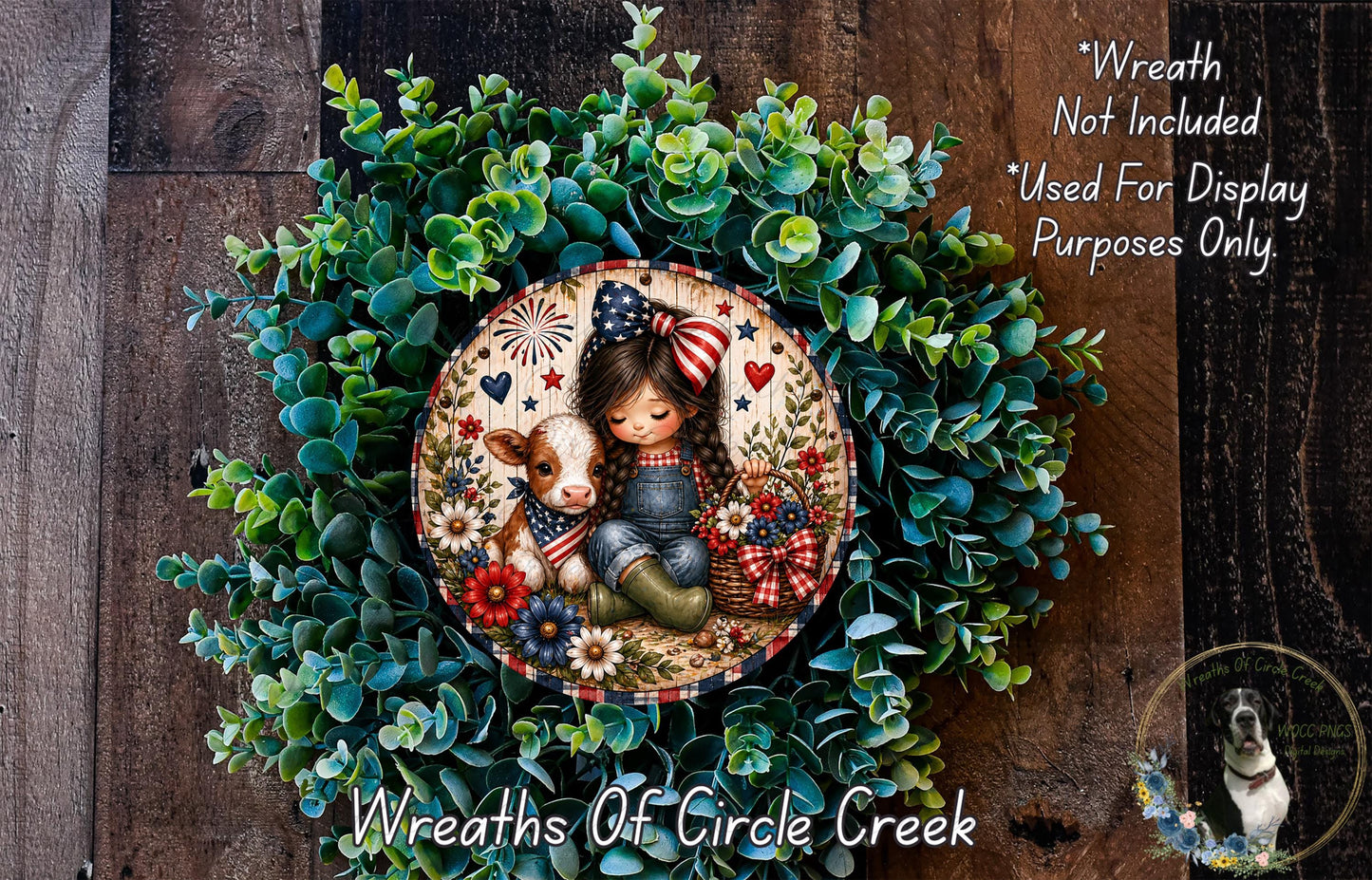 a wreath with a young girl and a cow, surrounded by green foliage. The wreath is displayed on a wooden surface, and there is a text overlay that reads "Wreath Not Included * Used For Display Purposes Only".