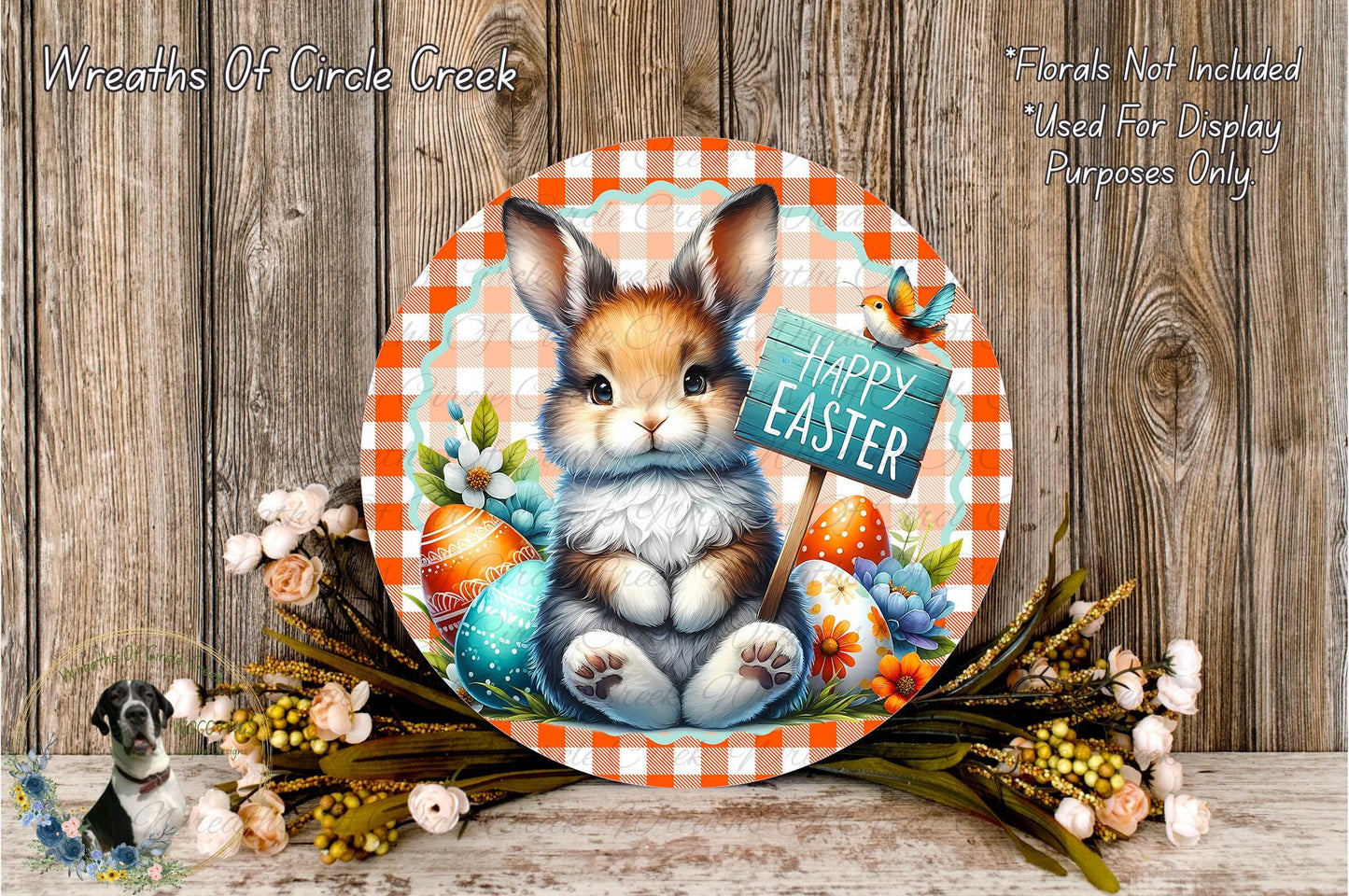 A round, decorative plate featuring a cartoon rabbit holding a sign that says "Happy Easter" surrounded by Easter eggs, flowers, and a bird.