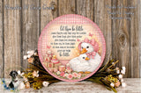 A decorative plate with a pink and white color scheme, featuring a mother duck and her ducklings surrounded by flowers and baby toys. The plate has a message that reads "Let them be little cause they're only that way for a while give them hope, give them praise, give them love everyday let them cry, let them giggle let them sleep in the middle just let them be little".