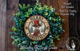 A wreath with a deer wearing a top hat and scarf, surrounded by greenery, with the text "MERRY CHRISTMAS" and "Wreaths of Circle Creek" displayed.