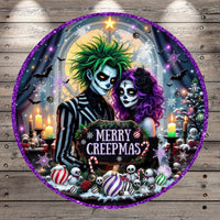 The image is a Halloween-themed collage featuring a couple dressed in spooky costumes, surrounded by various Halloween-related elements such as bats, skulls, snowflakes, and candy canes. The text "MERRY CREEPMAS" is prominently displayed in the center of the collage.