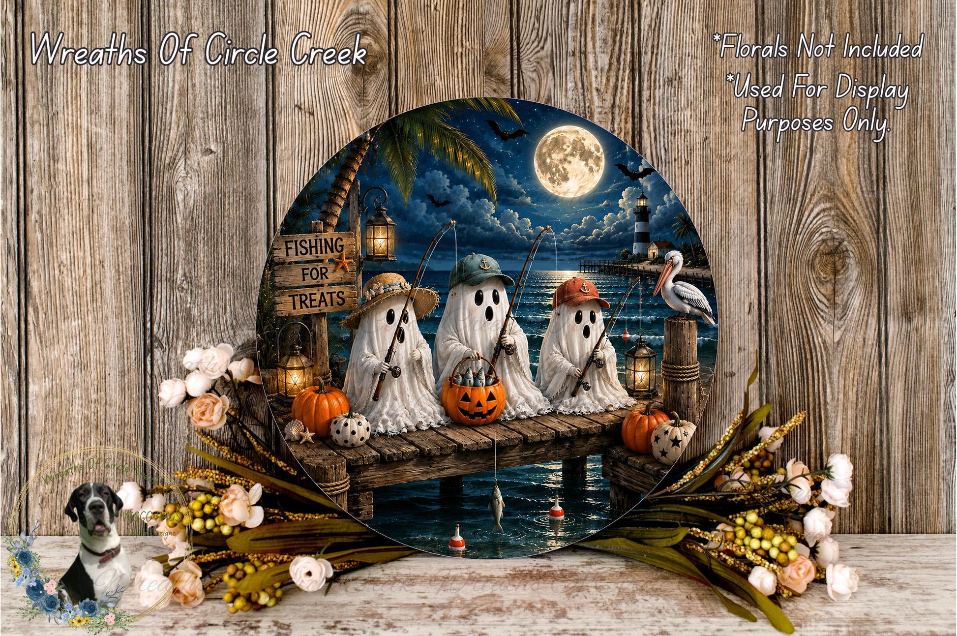 A Halloween-themed wreath featuring three ghostly figures fishing on a wooden dock, with a full moon and a lighthouse in the background. The wreath is surrounded by pumpkins, flowers, and other Halloween decorations, creating a festive and spooky atmosphere.