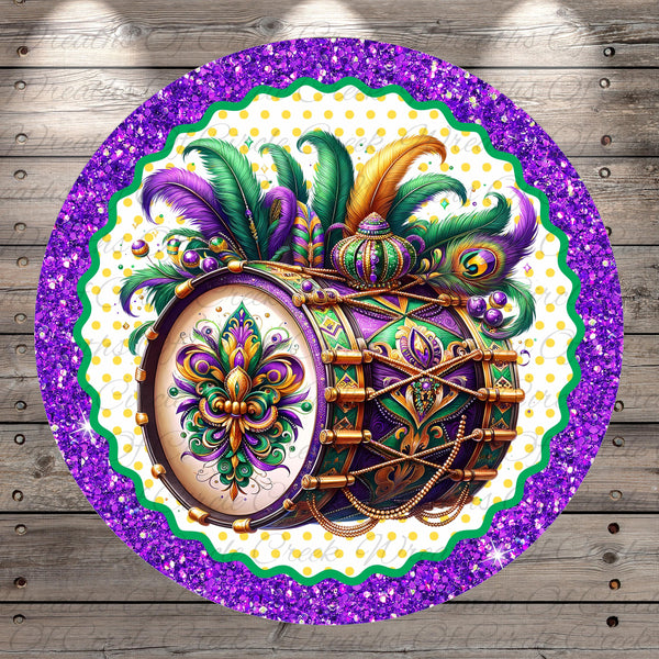 a decorative drum with a colorful and intricate design, surrounded by a purple and green border with a glittery pattern.