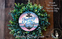 a wreath with a picture of an anchor on it