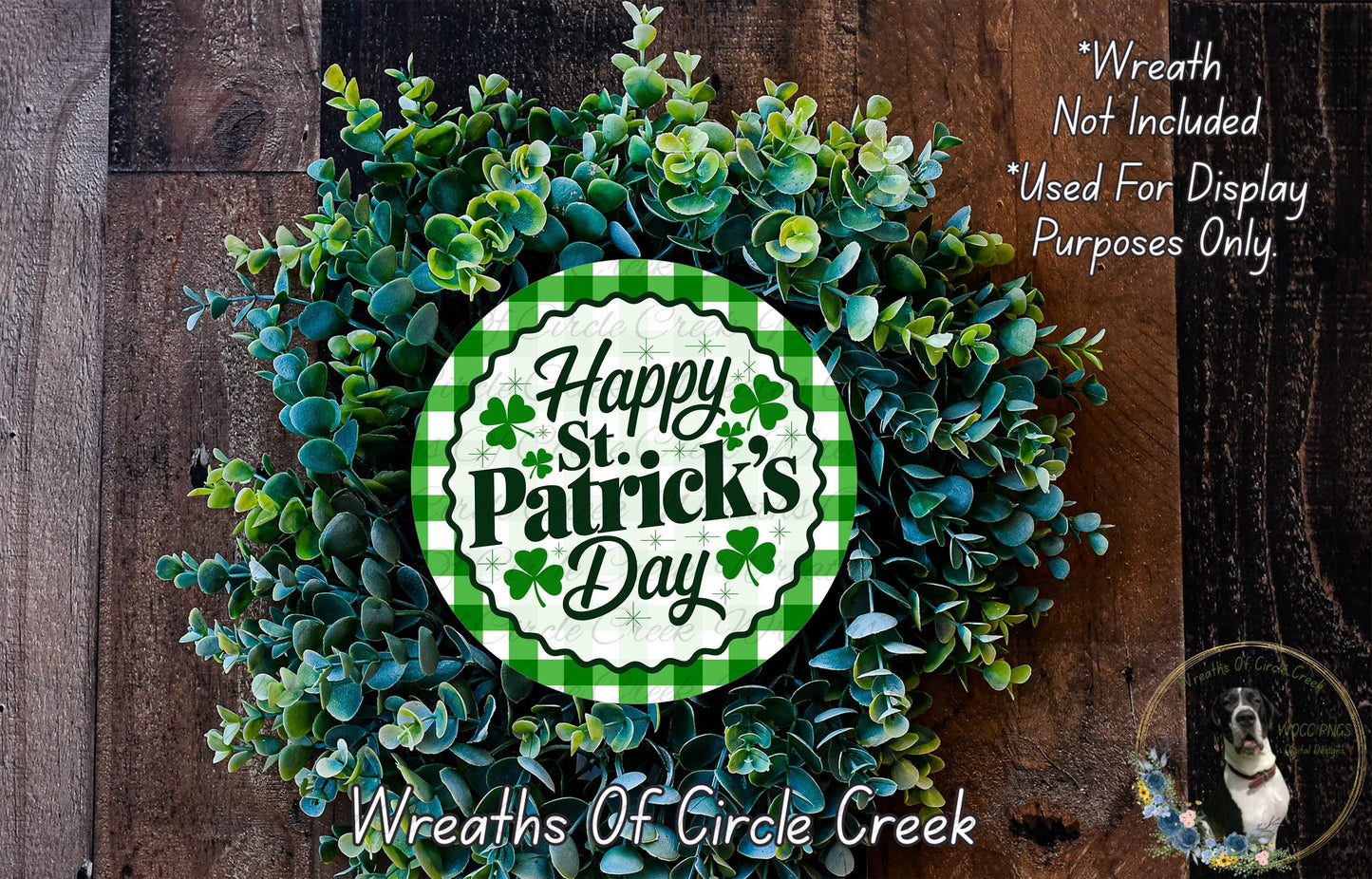 A wreath made of green and white leaves, with a circular sign that says "Happy St. Patrick's Day" in the center.