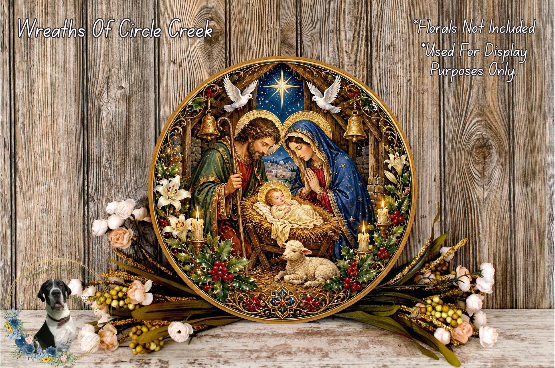 A decorative plate featuring the image of the Holy Family in a nativity scene, surrounded by flowers and greenery, placed on a wooden surface.