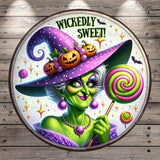 a painting of a witch holding a lollipop